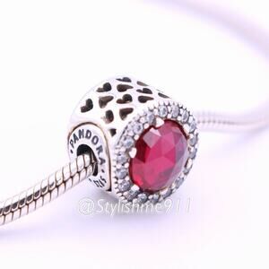 Authentic PANDORA ESSENCE Passion Charm with Synthetic Ruby